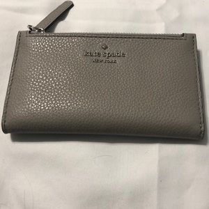 Authentic Kate Spade small slim bifold wallet NWT